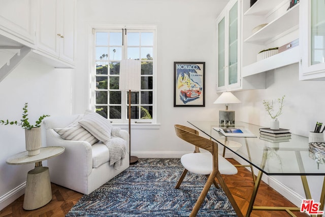 home office featuring dark parquet floors