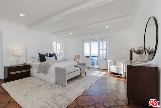 bedroom featuring beamed ceiling, access to exterior, and tile patterned floors