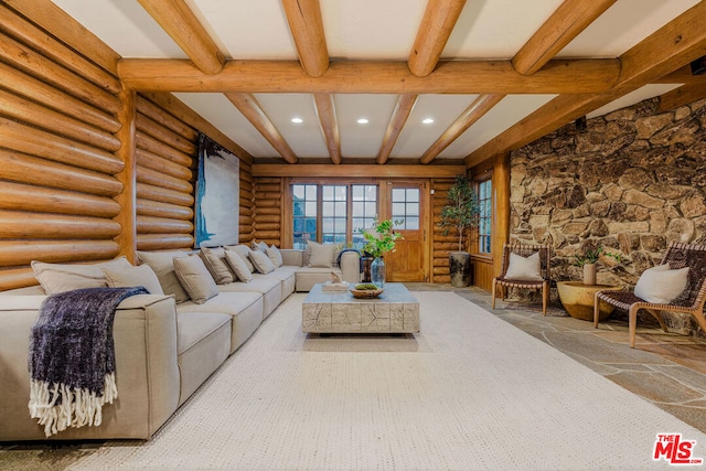 living room featuring beamed ceiling