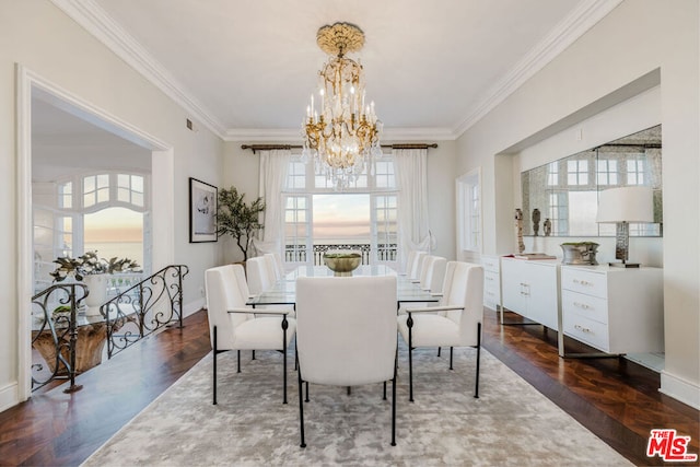 dining space with plenty of natural light, dark parquet flooring, crown molding, and a chandelier