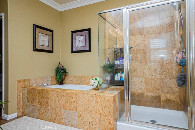 bathroom featuring independent shower and bath and crown molding