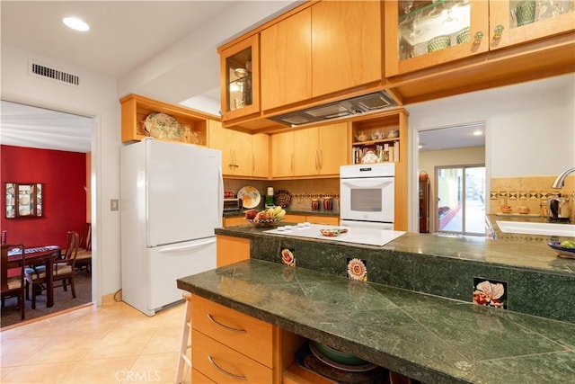 2541 Sleepy Hollow Dr, Glendale, CA 91206 - kitchen featuring white appliances, open shelves, glass insert cabinets, light tile patterned floors, and recessed lighting