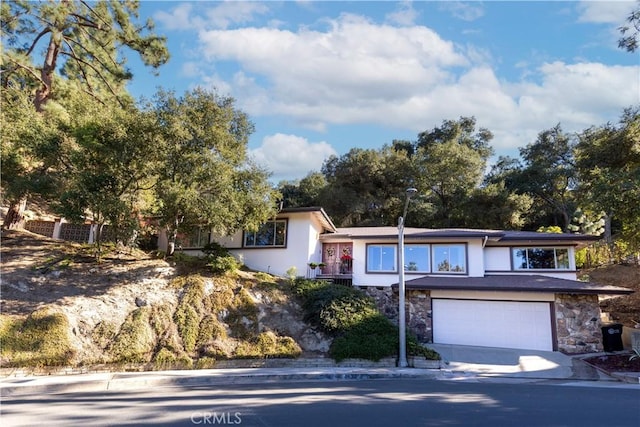 view of front of property with a garage