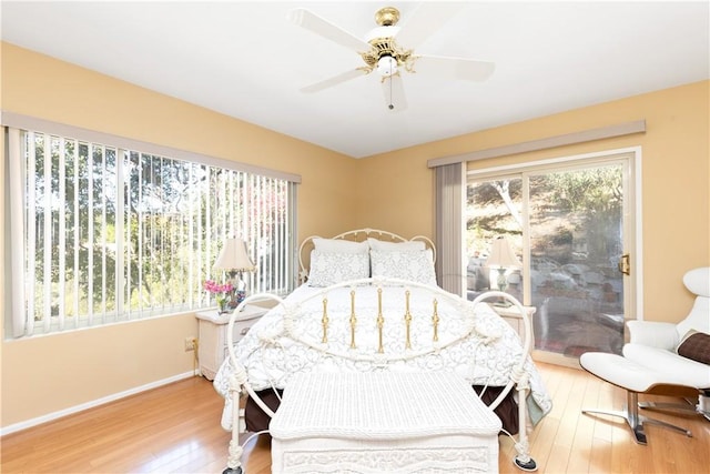 bedroom featuring hardwood / wood-style floors and ceiling fan