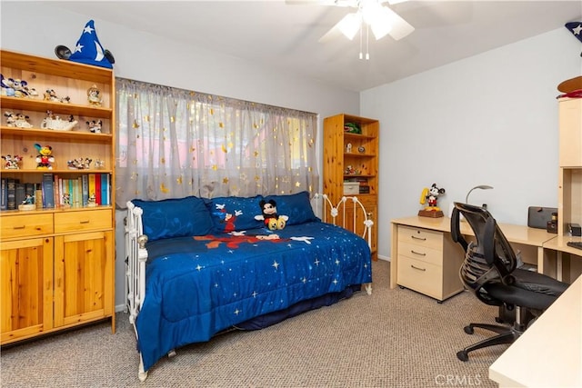 bedroom featuring light carpet and ceiling fan