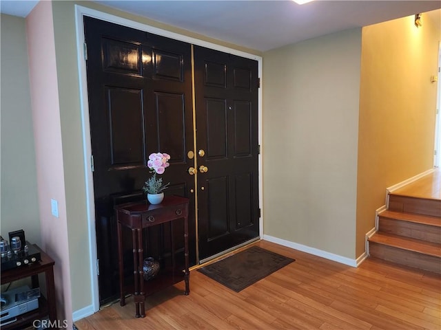 entrance foyer with light hardwood / wood-style flooring