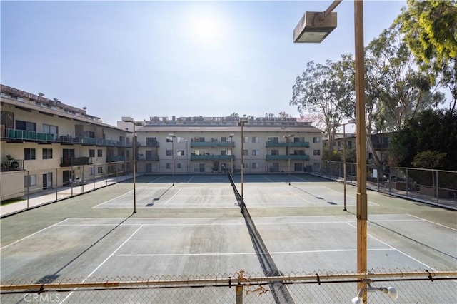 view of tennis court with basketball court