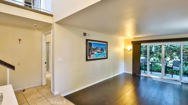 empty room featuring hardwood / wood-style flooring