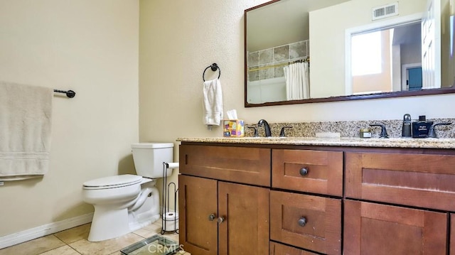 bathroom with tile patterned flooring, vanity, toilet, and curtained shower