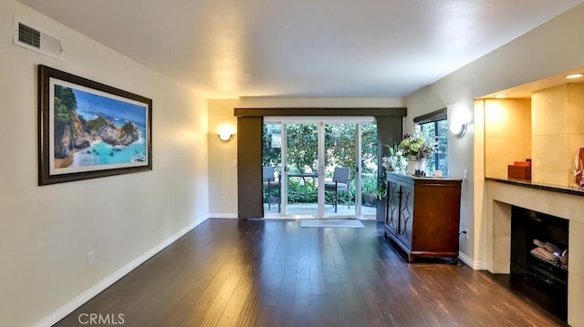 interior space with dark hardwood / wood-style flooring