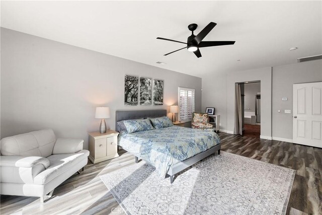 bedroom featuring wood-type flooring and ceiling fan