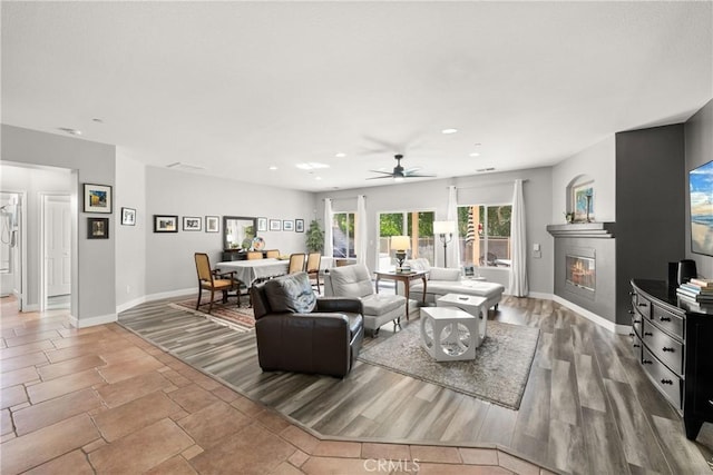 living room with ceiling fan