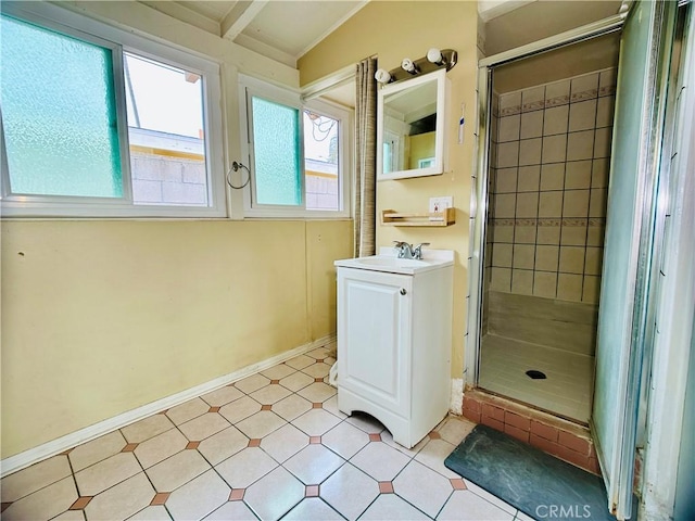 bathroom with a shower with door and vanity