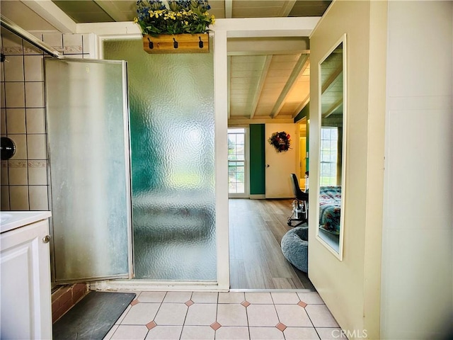 interior space featuring beam ceiling