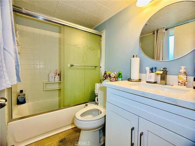 full bathroom featuring a textured ceiling, tiled shower / bath combo, tile patterned floors, vanity, and toilet