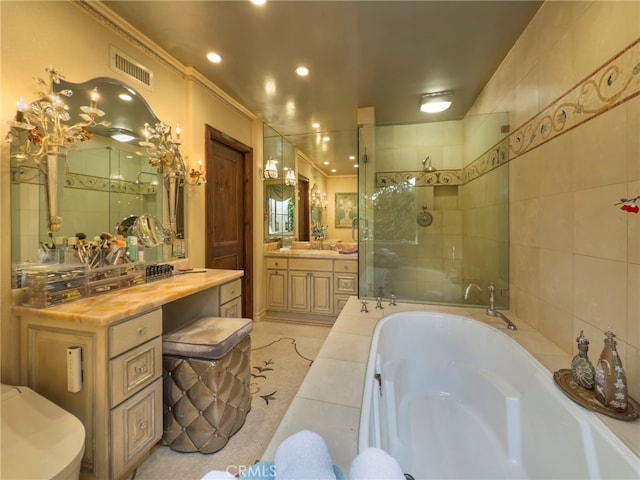 bathroom featuring recessed lighting, a tile shower, visible vents, vanity, and a bath