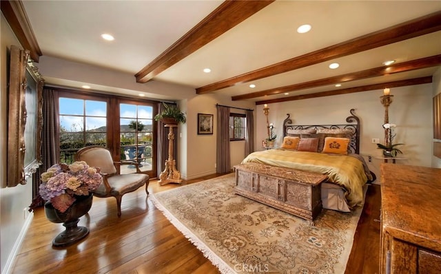 bedroom featuring beam ceiling, access to exterior, baseboards, recessed lighting, and hardwood / wood-style floors