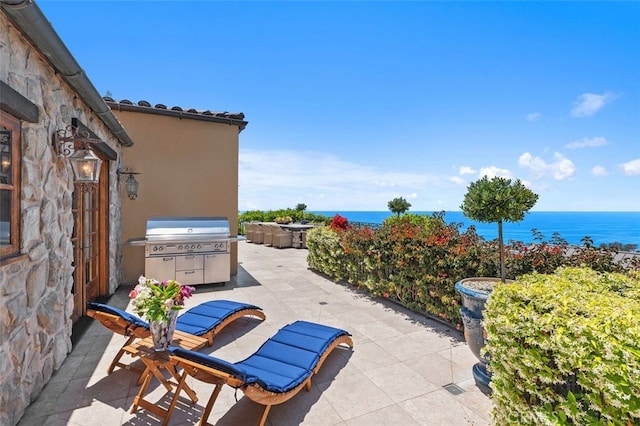 1330 Temple Hills Dr, Laguna Beach, CA 92651 - view of patio / terrace with a water view and a grill