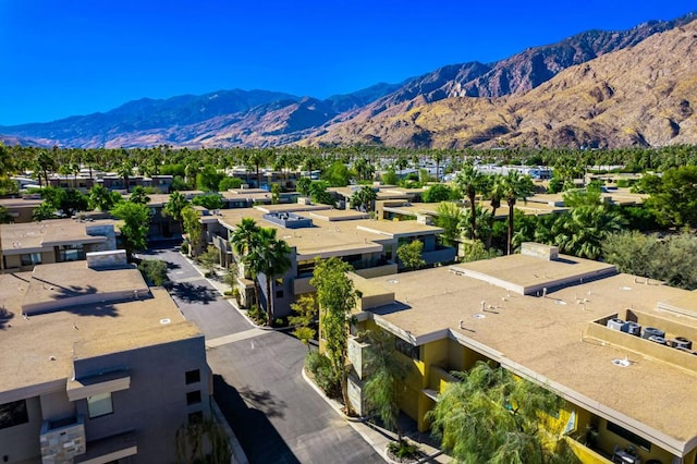 birds eye view of property featuring a mountain view