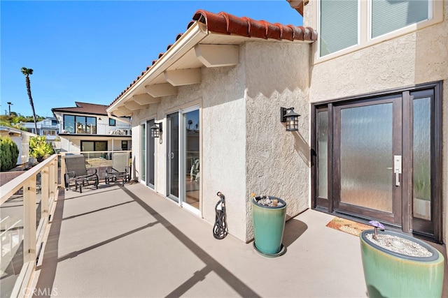 view of patio / terrace featuring a balcony