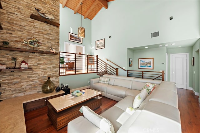 living room featuring high vaulted ceiling, beam ceiling, wooden ceiling, and dark hardwood / wood-style floors