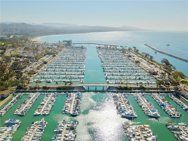 bird's eye view with a water and mountain view