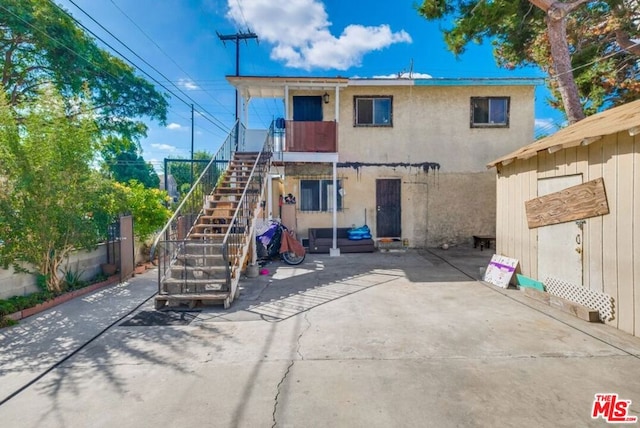 back of house featuring a patio area