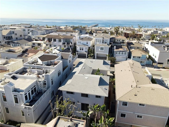 bird's eye view featuring a water view and a residential view