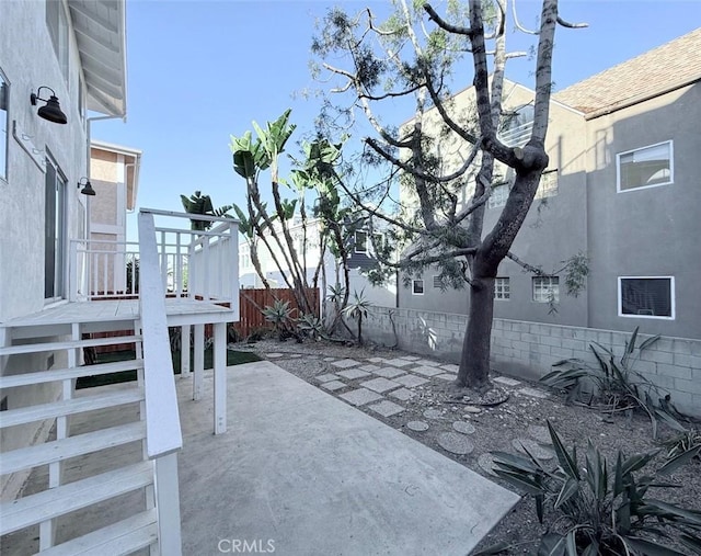 view of patio / terrace with fence