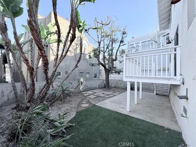 view of yard featuring a patio area and fence