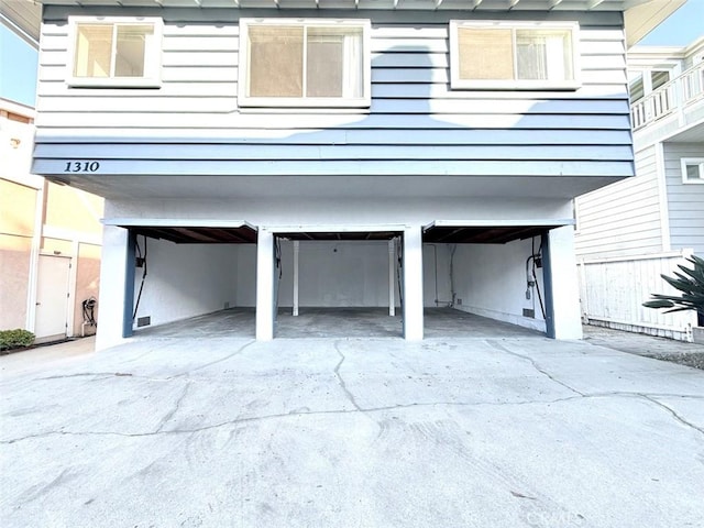 garage featuring driveway