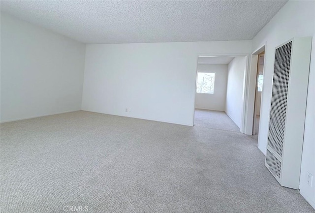 empty room featuring a textured ceiling