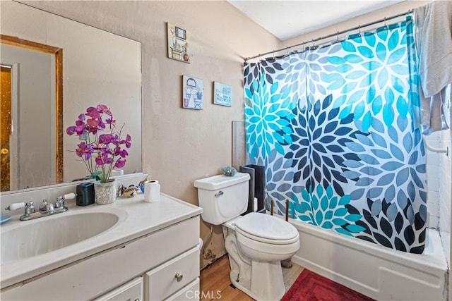 full bathroom with shower / bath combination with curtain, vanity, toilet, and hardwood / wood-style floors