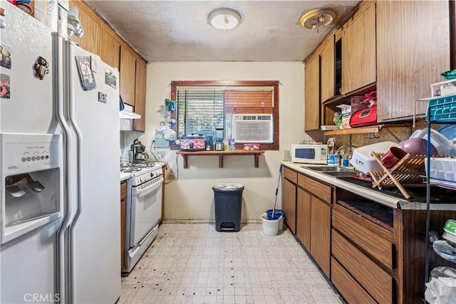 kitchen featuring cooling unit and white appliances