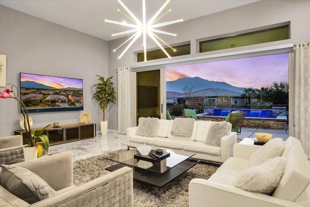 living room with a notable chandelier