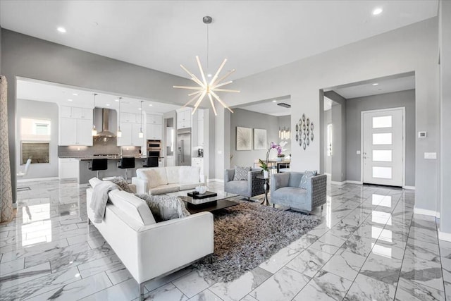 living room featuring plenty of natural light and a chandelier