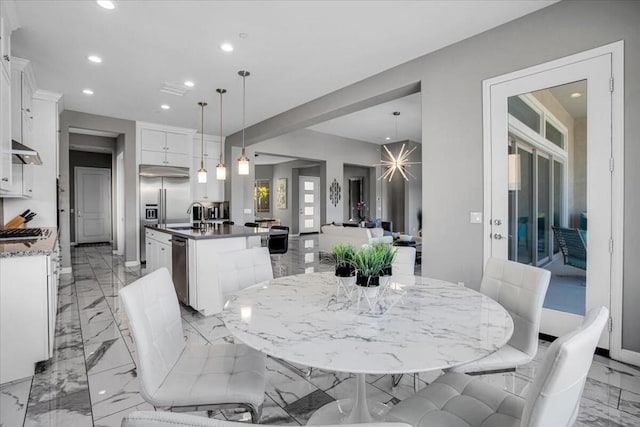 dining area featuring sink