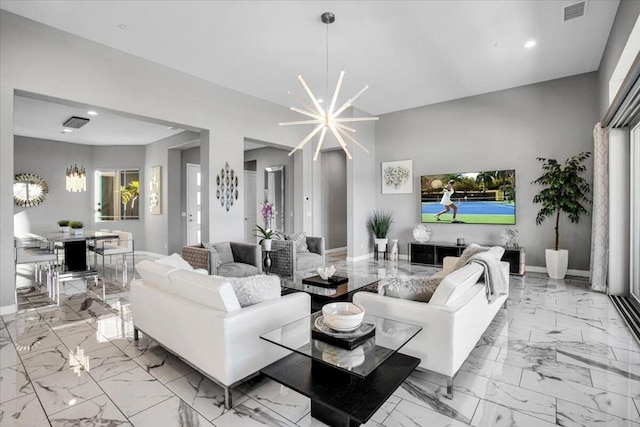 living room with an inviting chandelier