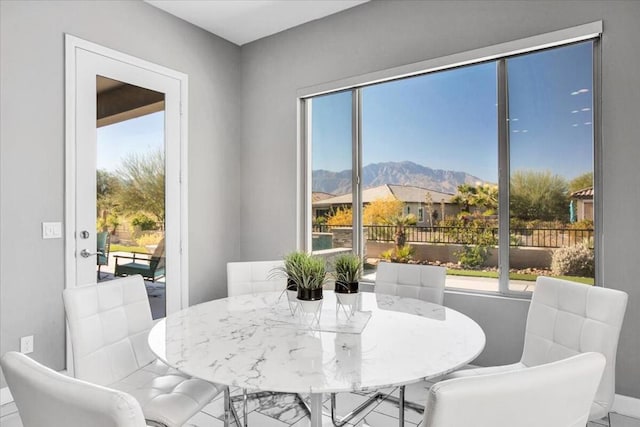 dining area featuring a mountain view