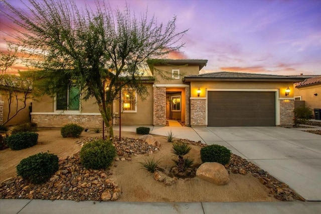 prairie-style house featuring a garage