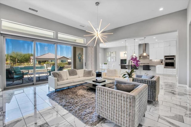 living room featuring a chandelier