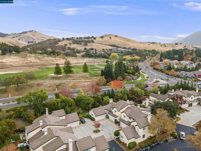 drone / aerial view featuring a mountain view