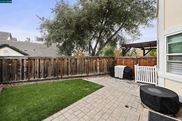 view of patio / terrace featuring a grill