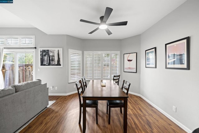 dining area with ceiling fan, dark hardwood / wood-style flooring, and a healthy amount of sunlight