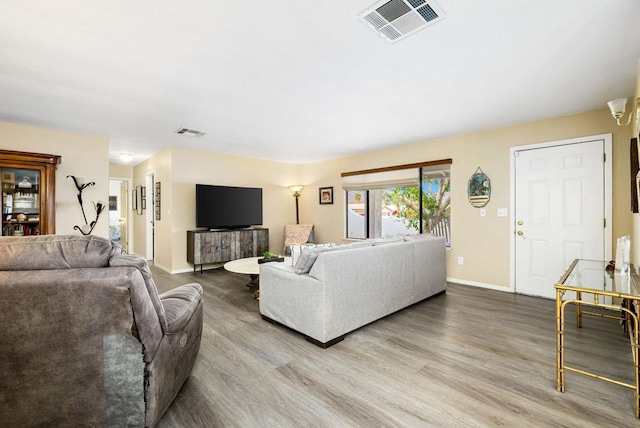 living room with hardwood / wood-style floors