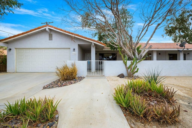 single story home featuring a garage