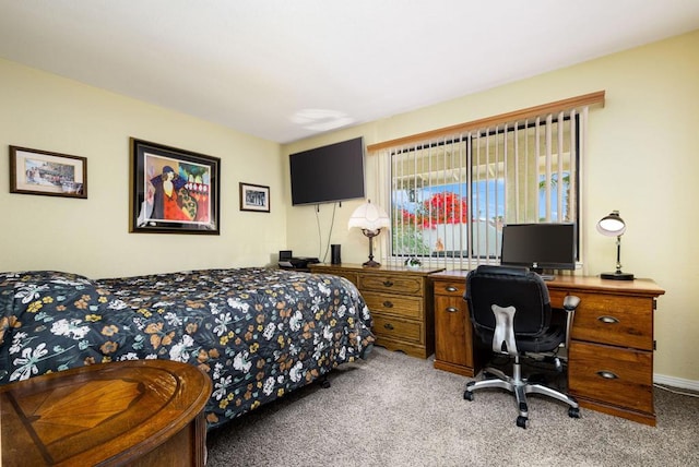 bedroom with light colored carpet