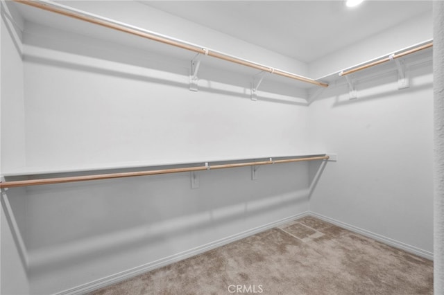 5418 Heitz Way, Fontana, CA 92336 - spacious closet featuring carpet floors