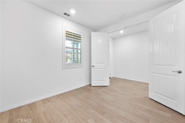 unfurnished bedroom with light hardwood / wood-style flooring