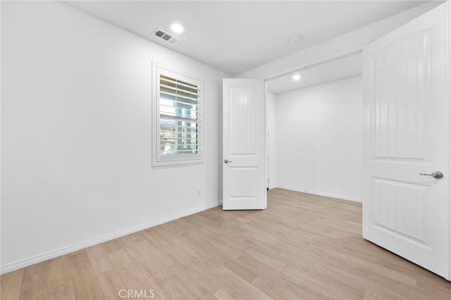 5418 Heitz Way, Fontana, CA 92336 - unfurnished bedroom with light wood-style flooring and recessed lighting